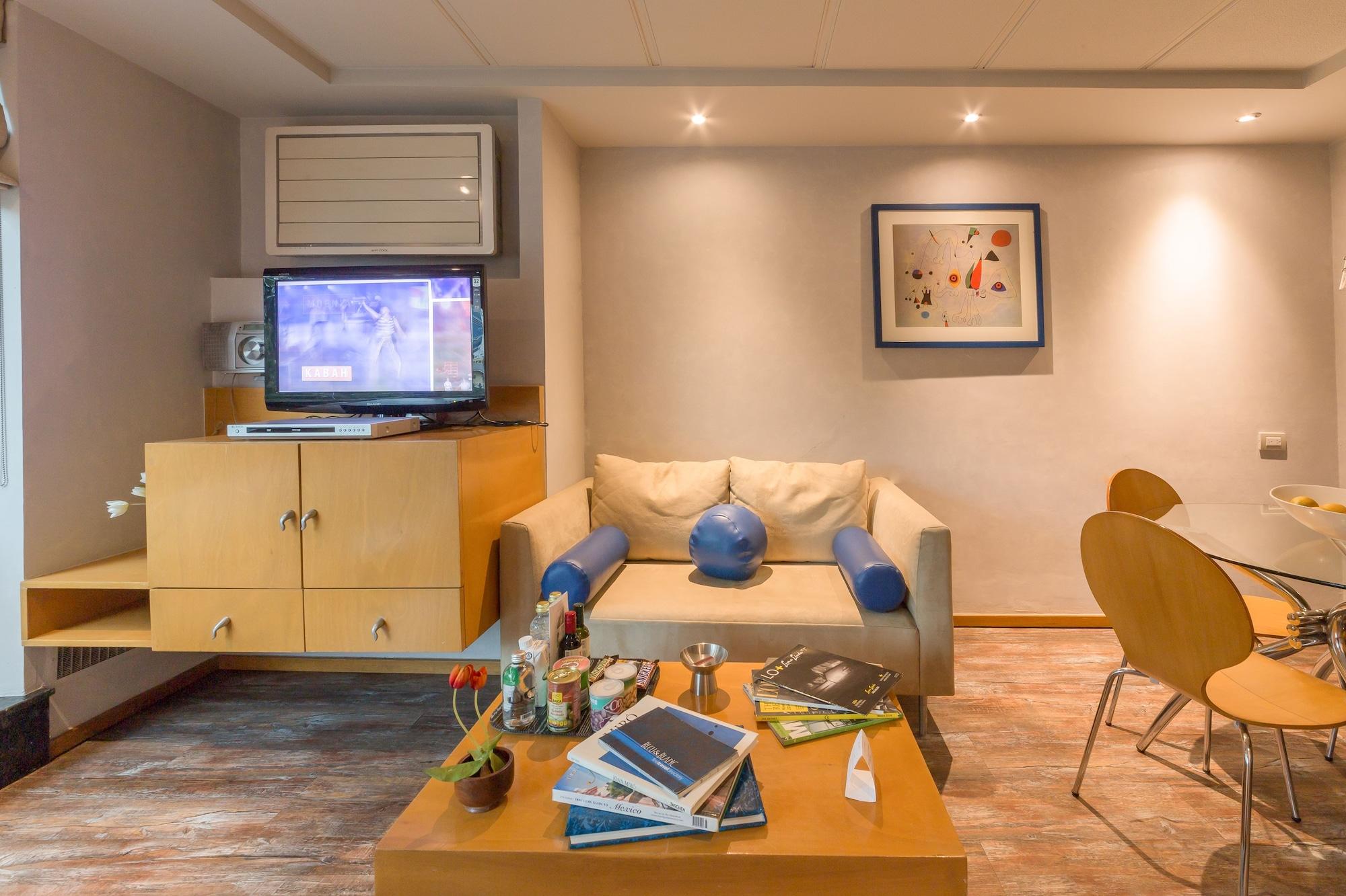 金宝套房酒店 墨西哥城 外观 照片 A living room in a hotel suite